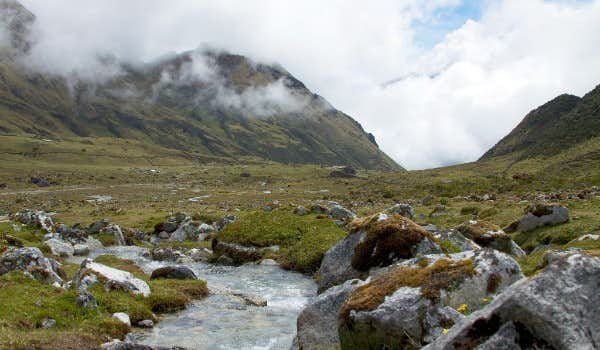 creek in the valley during the salkantay trekking tour