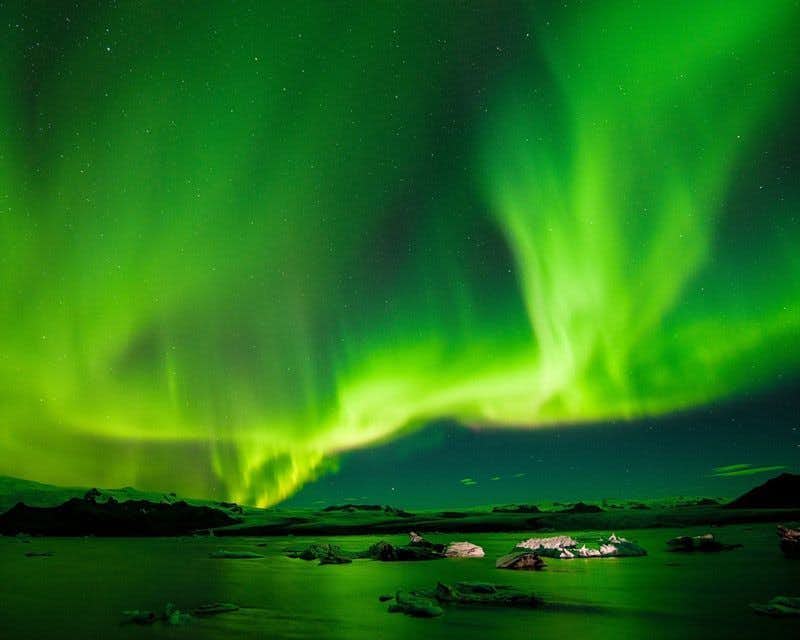 Island grünes Nordlicht Lagune
