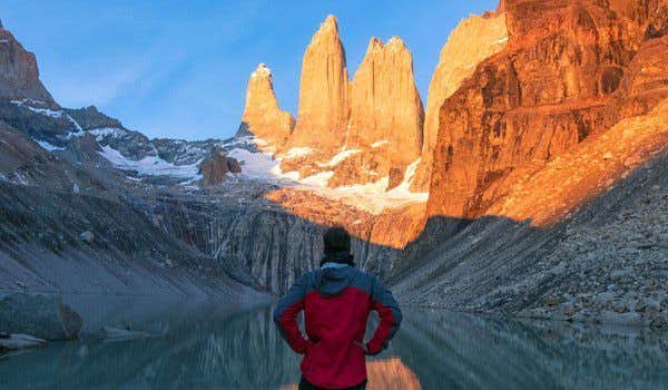 traveler in viewpoint base torres del paine