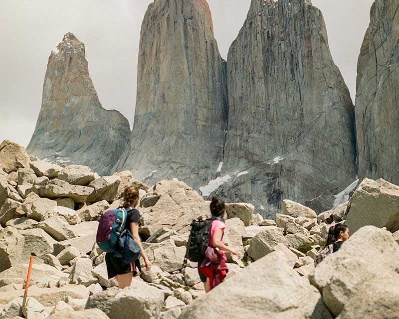 two girls arriving at the base viewpoint torres