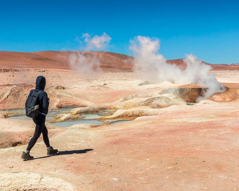 person walking on the geysers