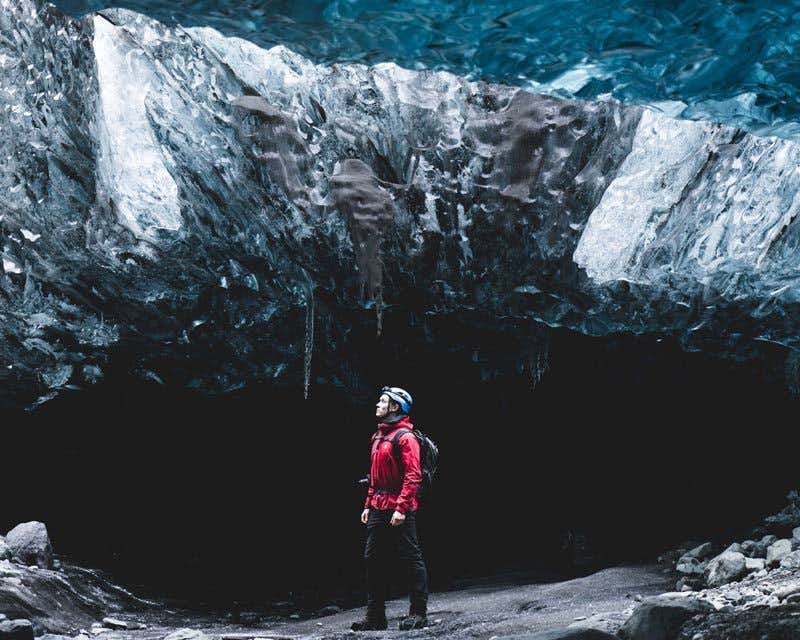 boy inside the sapphire ice cave