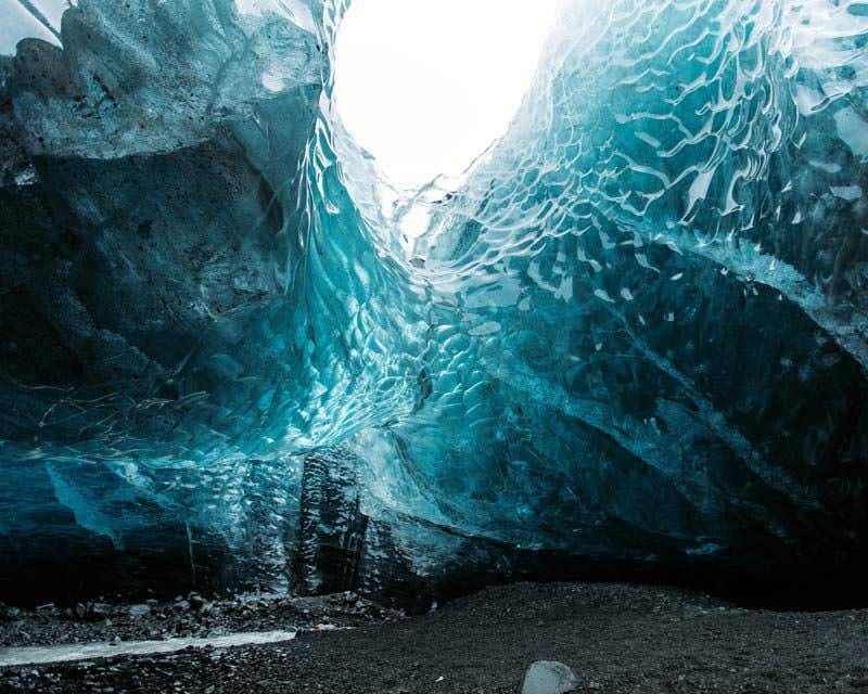 interior of the sapphire blue ice cave in iceland