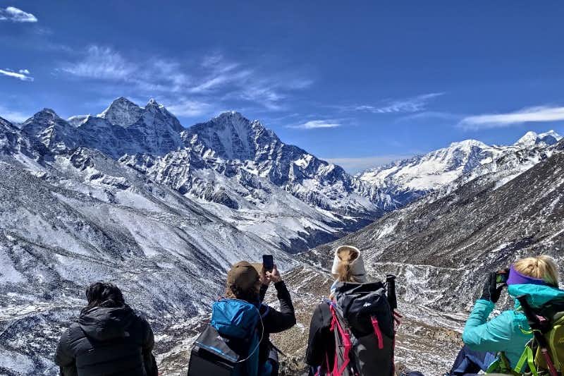 Hikers taking photo on Dingboche route