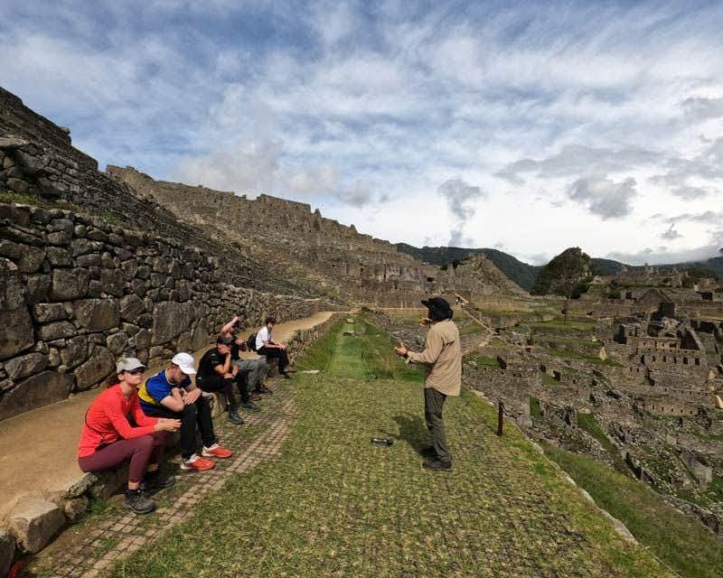 guide explaining on the guided tour of machu picchu 