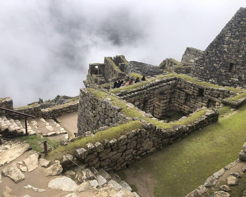 people in the ruins of machu picchu
