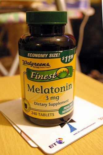 Bottle of melatonin pills for jet lag