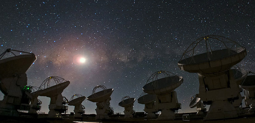 telescopes with stars in the sky in alma atacama
