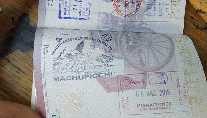 passport stamped with the stamp of machu picchu