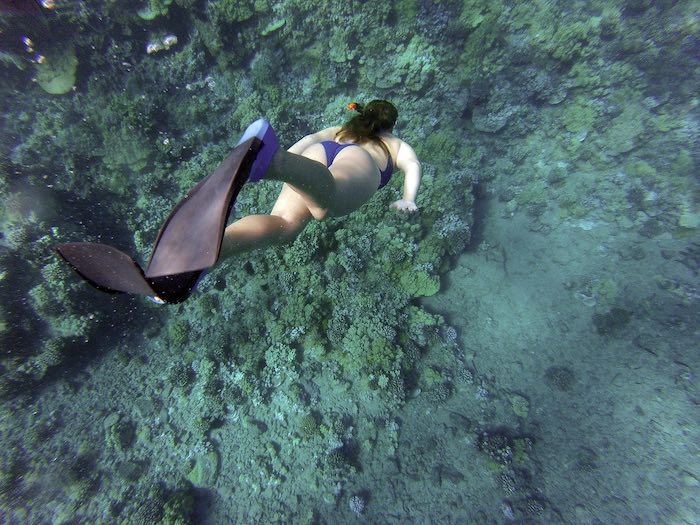 Mujer haciendo snorkel Sian Ka'an México