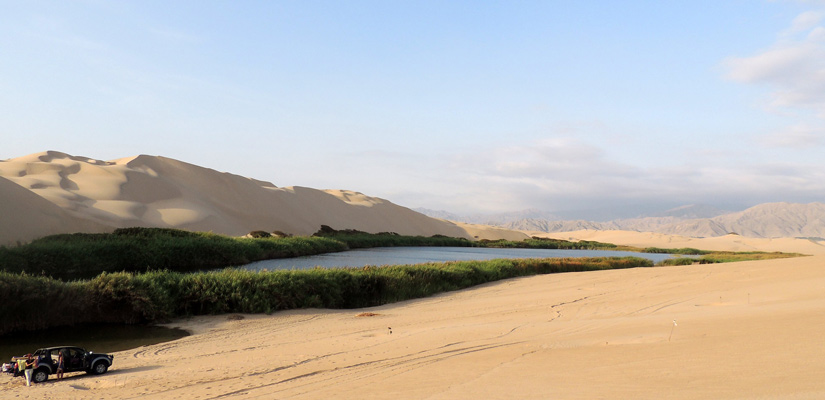 landscape of desert with moron lagoon in peru