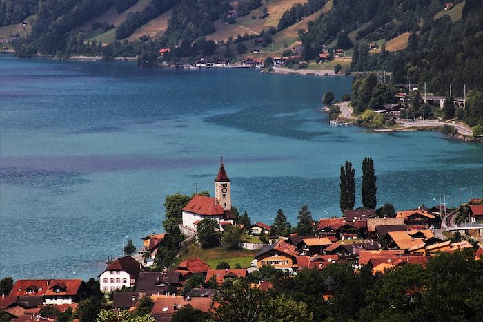 Swiss colony settlement around a crystal-clear lake