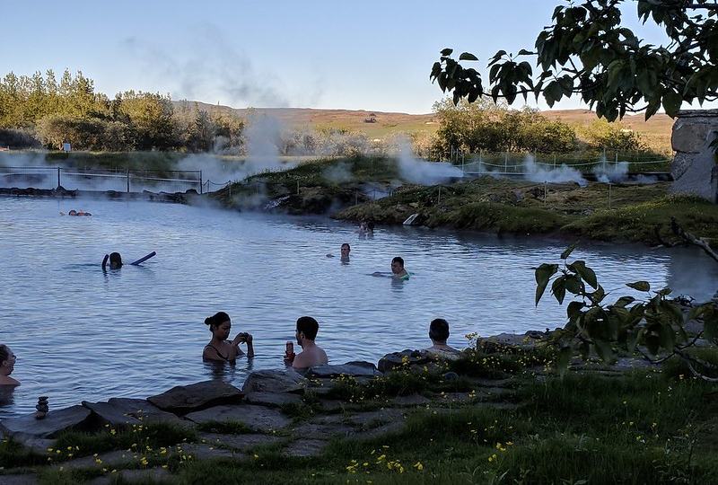 people having a bath in the secret lagoon