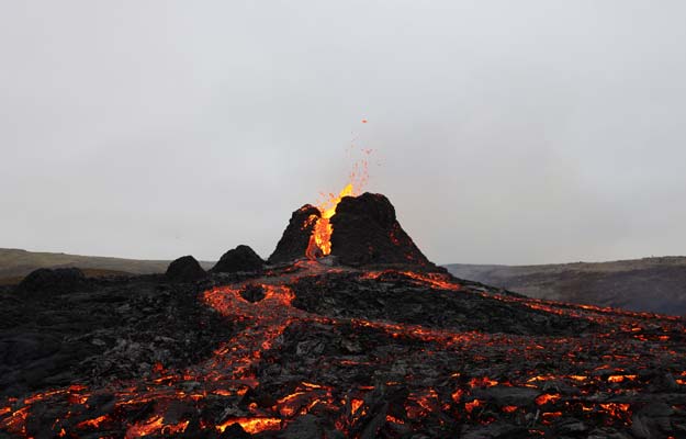Fagradalsfjall volcano erupting trekking